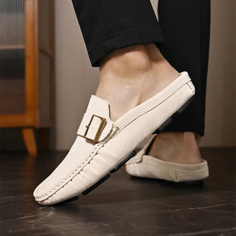 Cream suede loafer mule with square buckle strap and contrast stitching