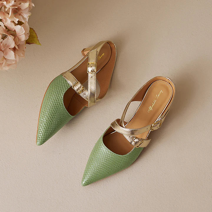 Pair of green textured leather mules with pointed toe and gold buckle ankle strap