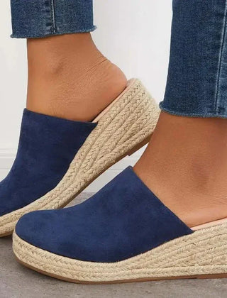 Blue slip-on wedge sandals with textured jute footbed and espadrille sole