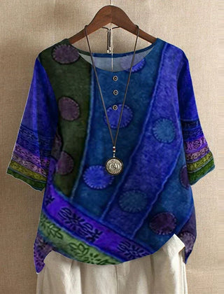 Women’s vintage floral blouse, royal blue with circular patch print, short sleeves.