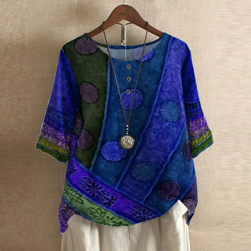 Women’s vintage floral blouse, royal blue with circular patch print, short sleeves.