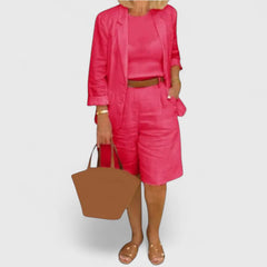 Red 2-piece suit set with blazer jacket and tailored shorts, with waist belt and tote