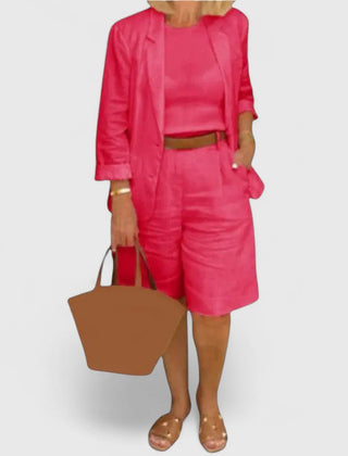 Red 2-piece suit set with blazer jacket and tailored shorts, with waist belt and tote