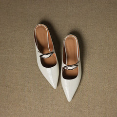 Two-tone leather mules, pointed toe with black upper and silver buckle strap