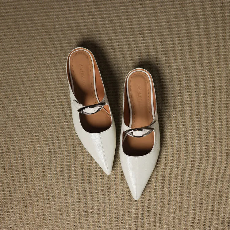 Two-tone leather mules, pointed toe with black upper and silver buckle strap