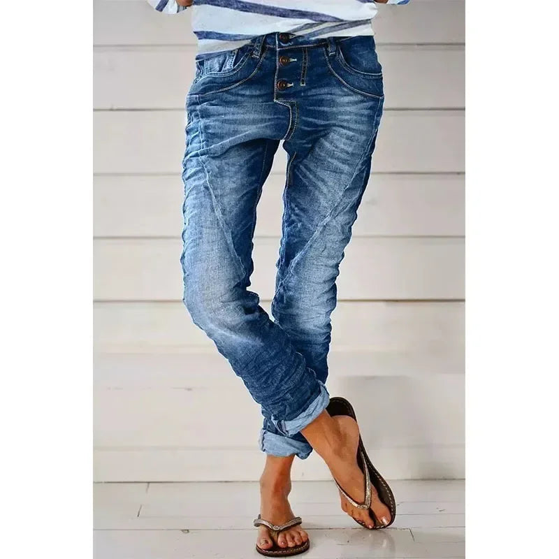 Stretch jeans in blue denim, contrast stitching, slim fit with rolled cuffs