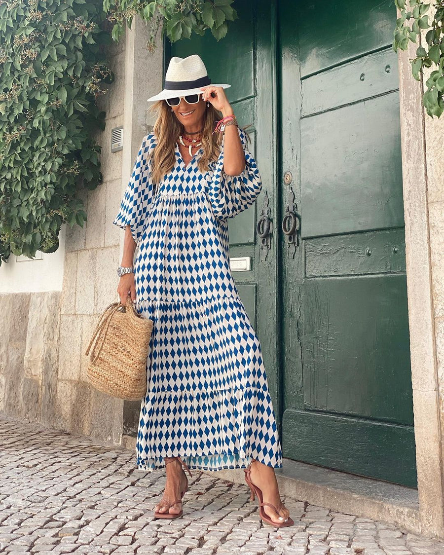 Blue and white bohemian long dress with geometric print, V-neck, short sleeves, side tiers