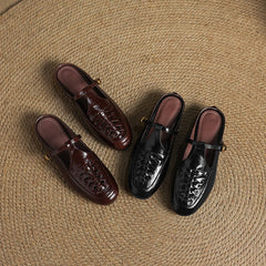 Set of leather mules in brown and black with lace-up front and low heel
