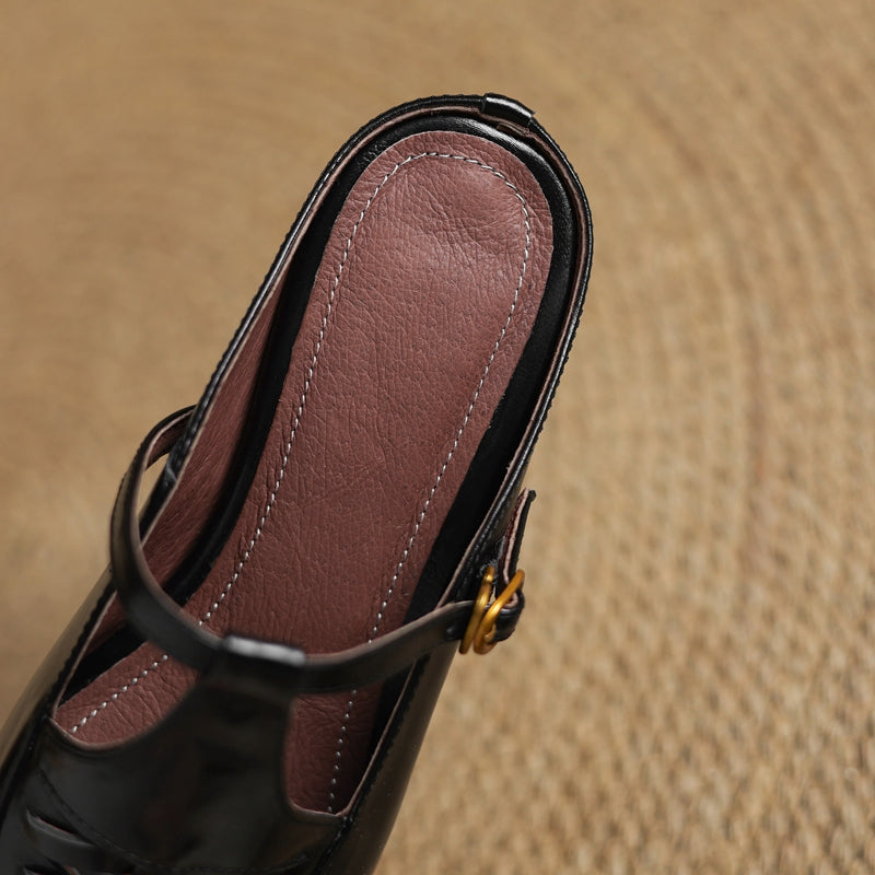 Close-up of brown leather mule showing interior lining and lace-up vamp