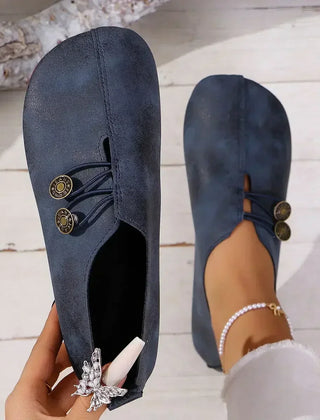 Women’s orthopedic suede loafers, dark navy lace-up with decorative medallion detail