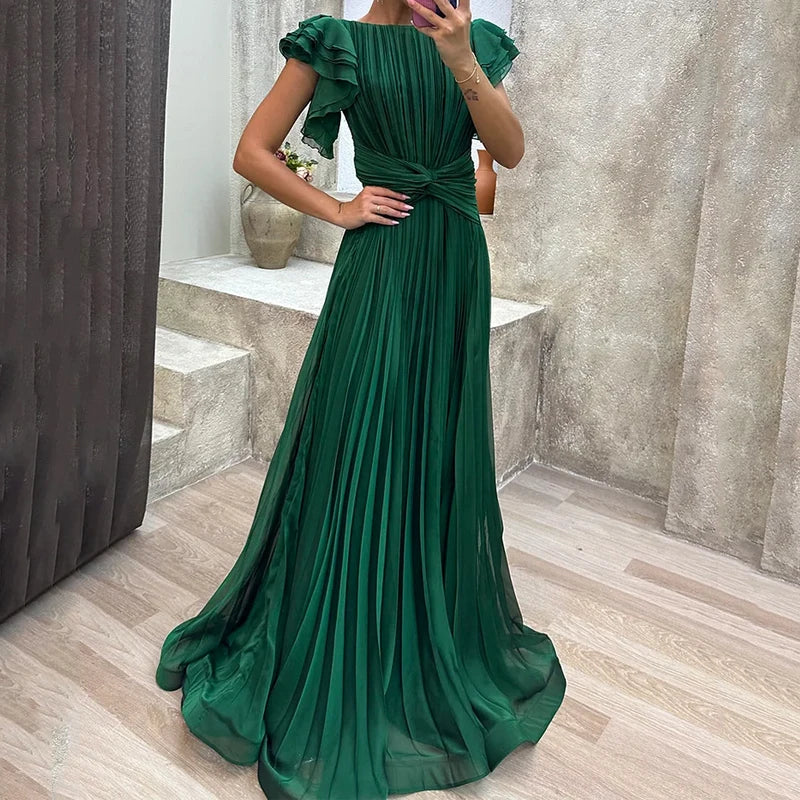Green pleated evening dress with ruffle sleeves and belted waist