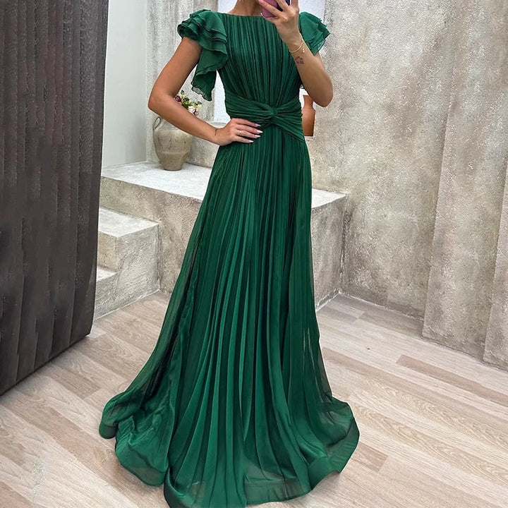 Green pleated evening dress with ruffle sleeves and belted waist