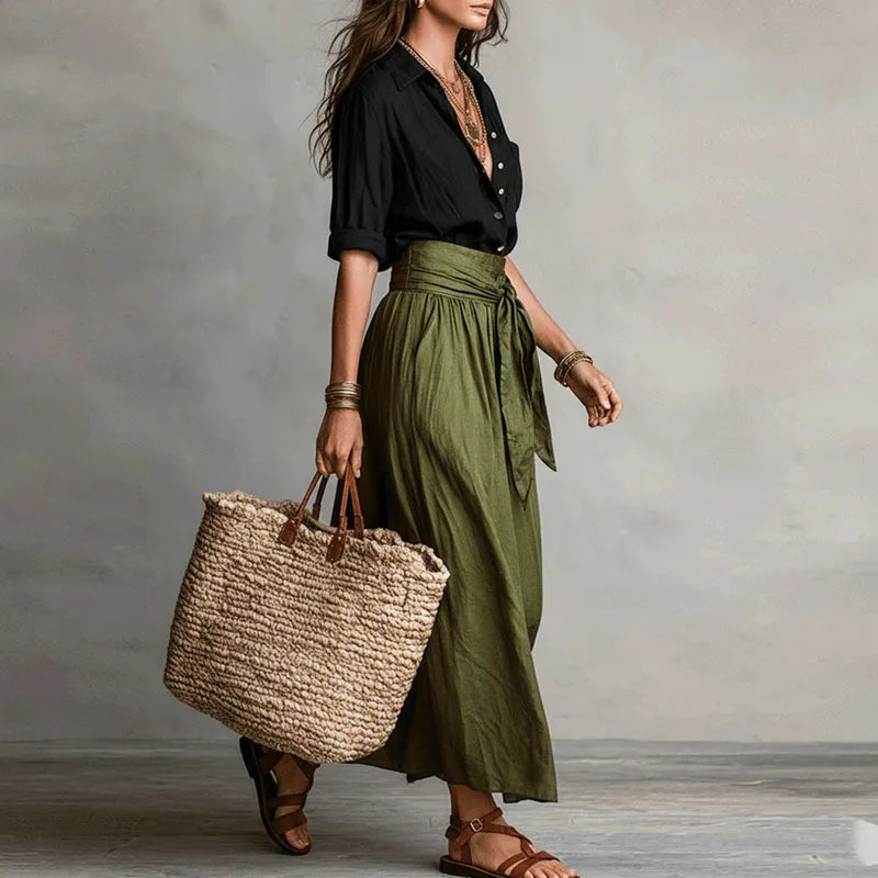 Two-tone maxi dress with black wrap-style bodice and olive green gathered skirt