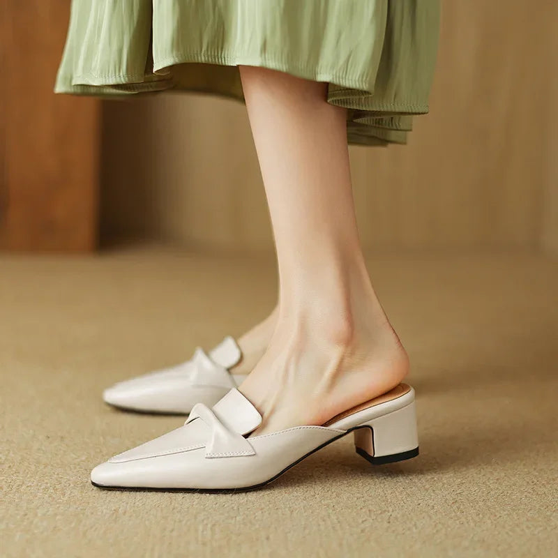 Beige genuine leather mule shoes with slip-on V-shaped strap and low block heel
