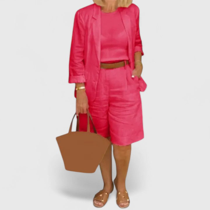 Red 2-piece suit set with blazer jacket and matching shorts, styled with waist belt