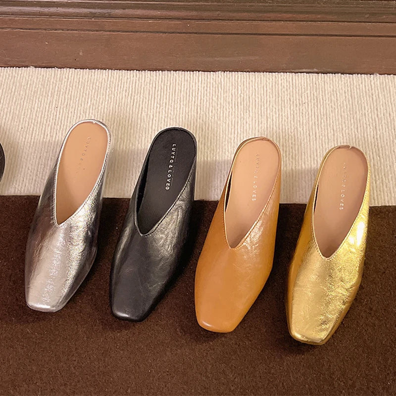 Lyra mules in silver, black, brown, and gold with pointed toe and low block heel