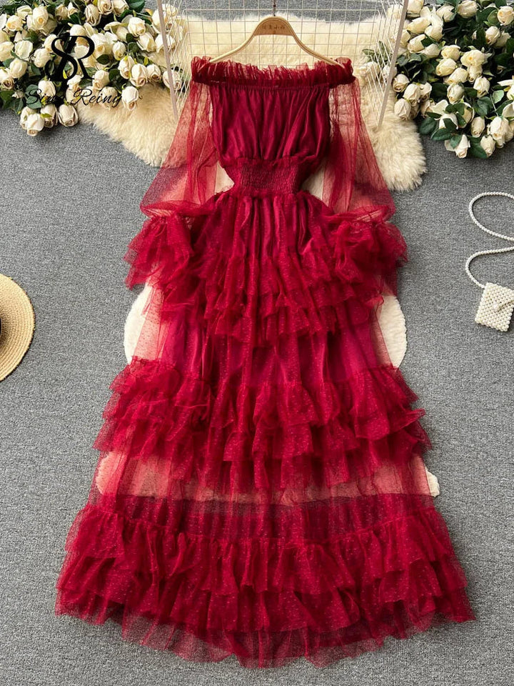 Red sheer tiered ruffle dress with smocked bodice and off-shoulder neckline