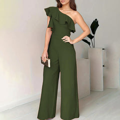 Green one-shoulder jumpsuit with layered ruffle detail and wide-leg trousers