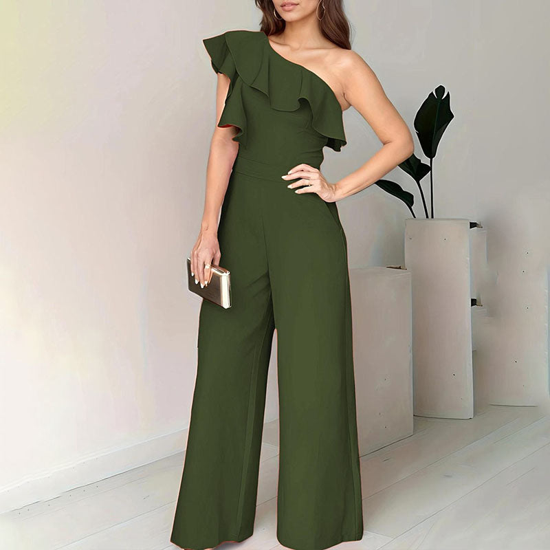 Green one-shoulder jumpsuit with layered ruffle detail and wide-leg trousers