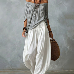 Grey off-shoulder top and white draped harem pants resort set with off-shoulder neckline