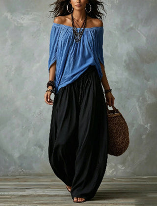 Blue off-shoulder top and black draped harem pants resort set with wide neckline