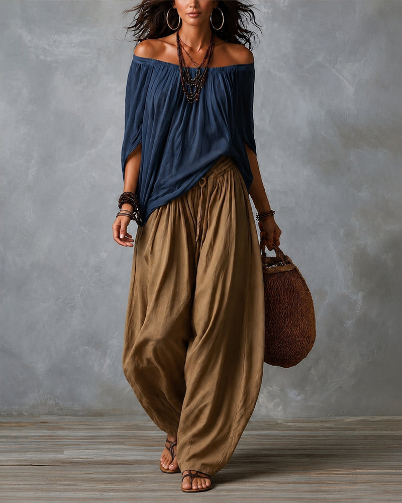Navy off-shoulder top and olive draped harem pants resort set with wide neckline
