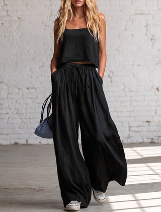 Black crop cami top with matching drawstring wide-leg pants, gathered waist