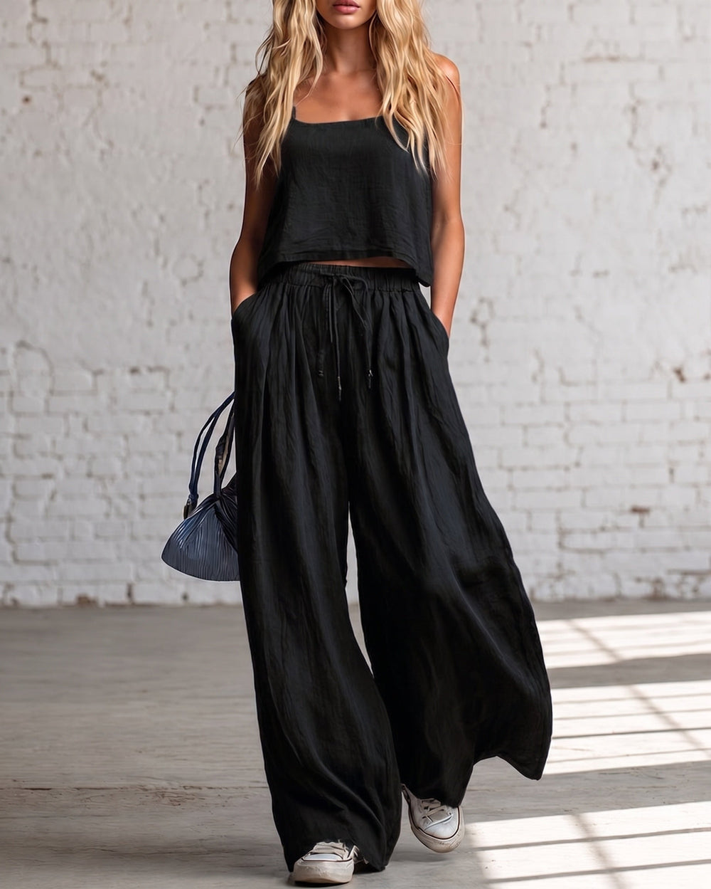 Black crop cami top with matching drawstring wide-leg pants, gathered waist