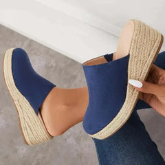 Blue wedge slide sandals with jute-textured sole and open heel