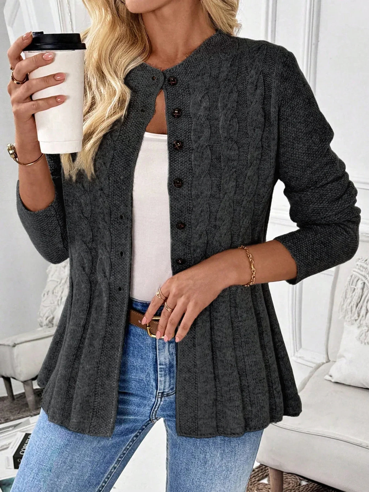 Charcoal ribbed cardigan with button front, long sleeves, and peplum hem