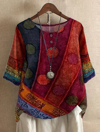 Women’s vintage floral blouse, red with multi-color patch and floral pattern, short sleeves.