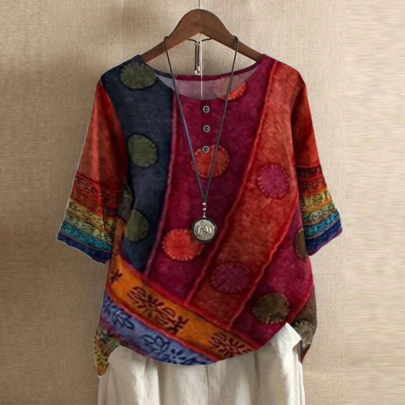 Women’s vintage floral blouse, red with multi-color patch and floral pattern, short sleeves.