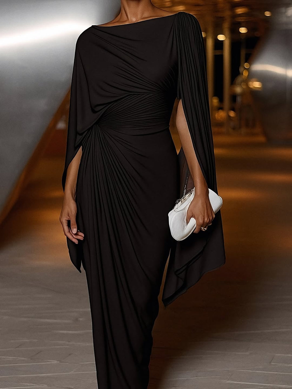 Black pleated drape maxi dress with twisted bodice and cape-like sleeves