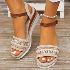 Woven espadrille wedge sandals with pearl ankle charms and patterned front band