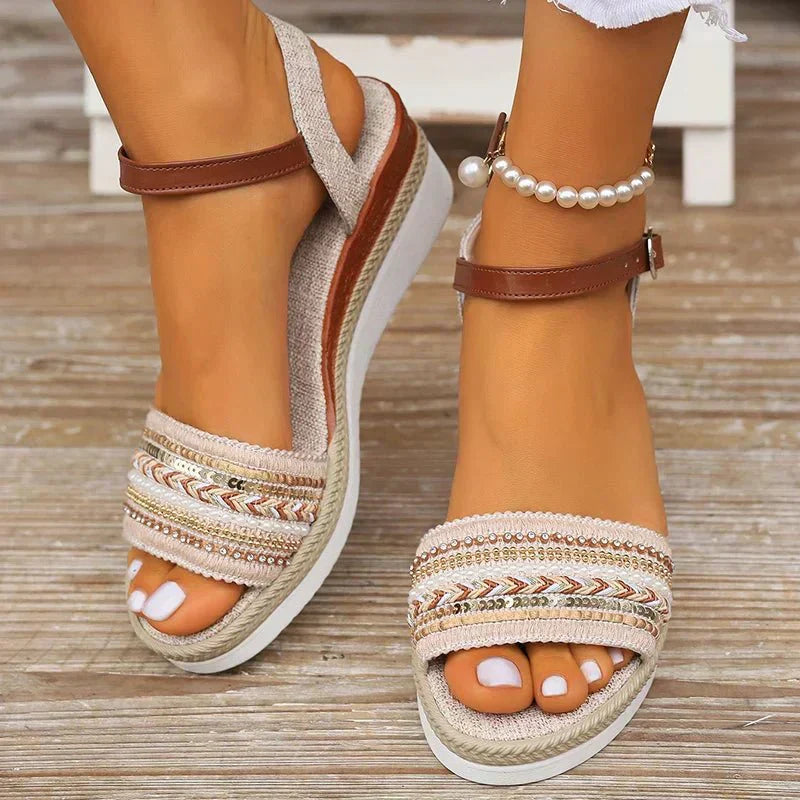 Woven espadrille wedge sandals with pearl ankle charms and patterned front band