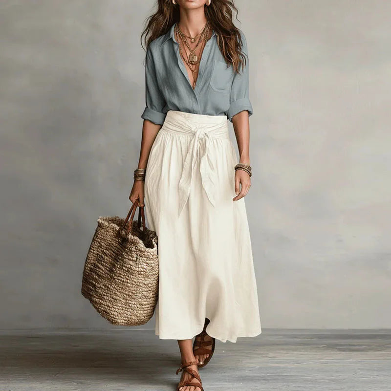 Two-tone maxi dress with gray-blue wrap-style bodice and white gathered skirt