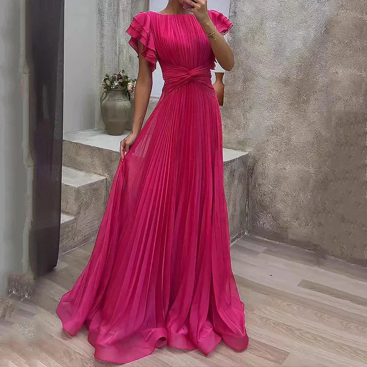 Pink pleated evening dress with ruffle sleeves and gathered belted waist
