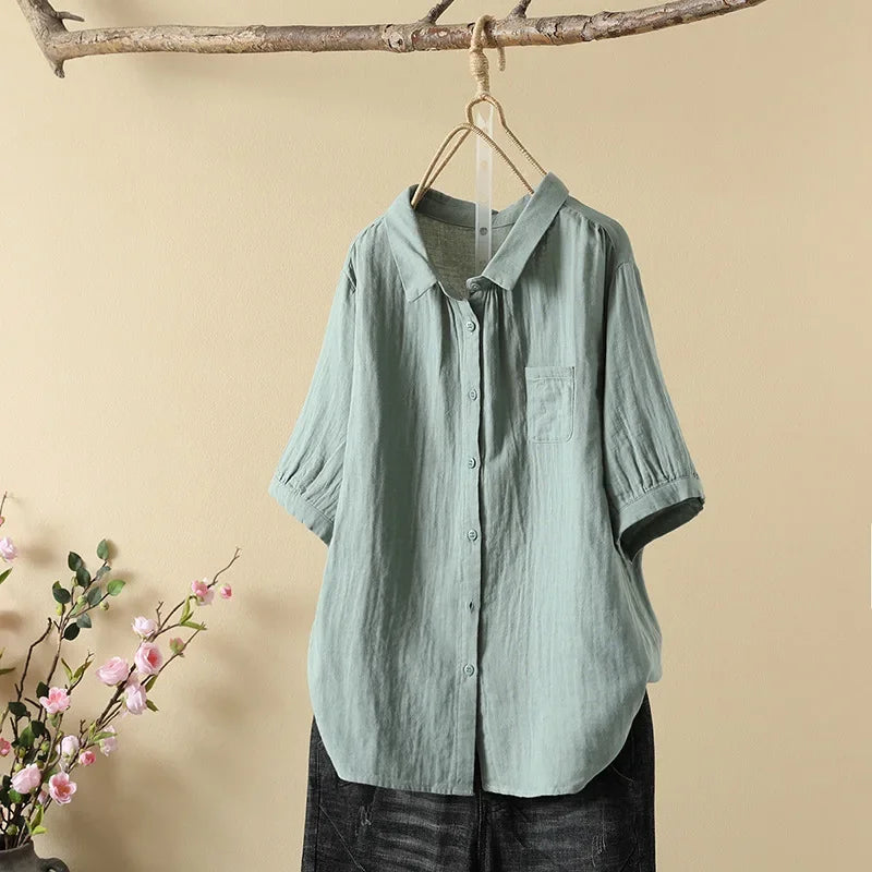 Loose casual button-up blouse, short sleeves, point collar, light green