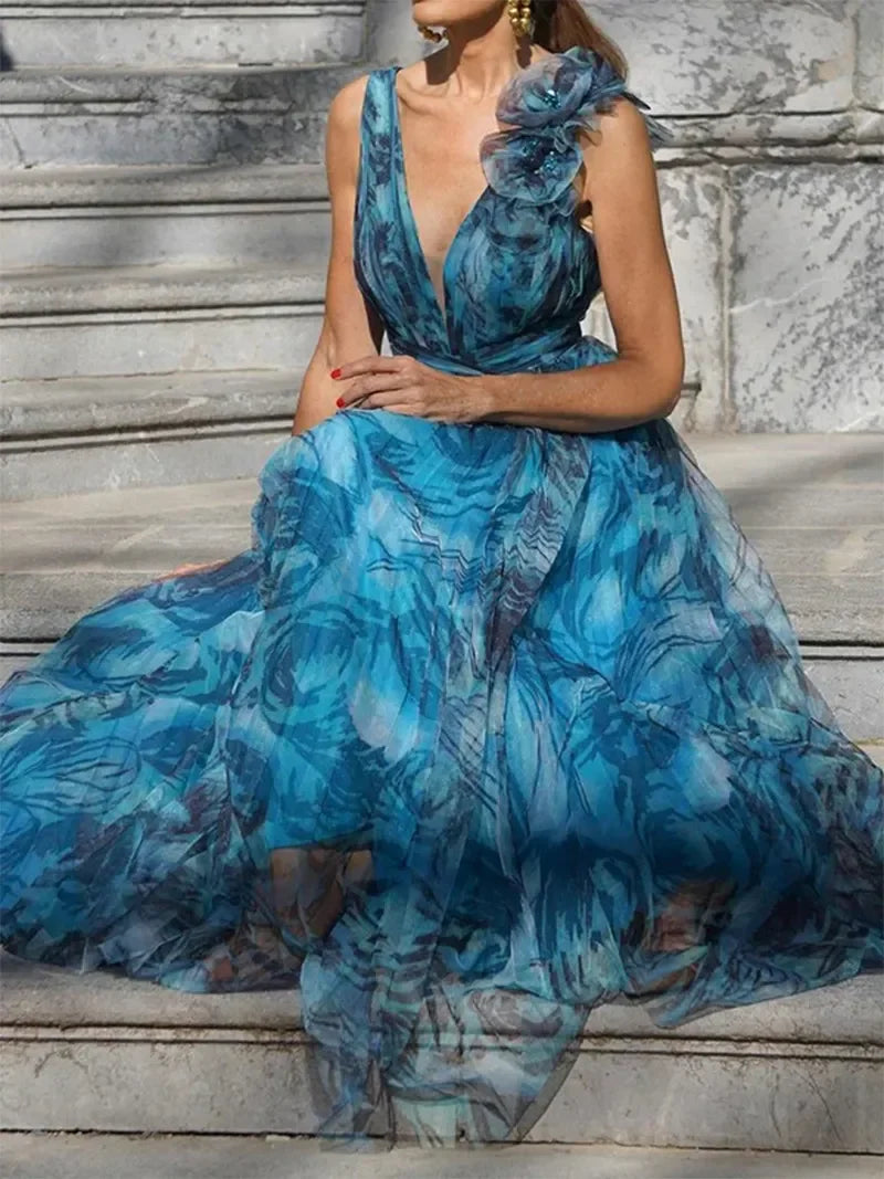 Peacock blue maxi dress with one shoulder ruffle, fitted waist, full gathered skirt