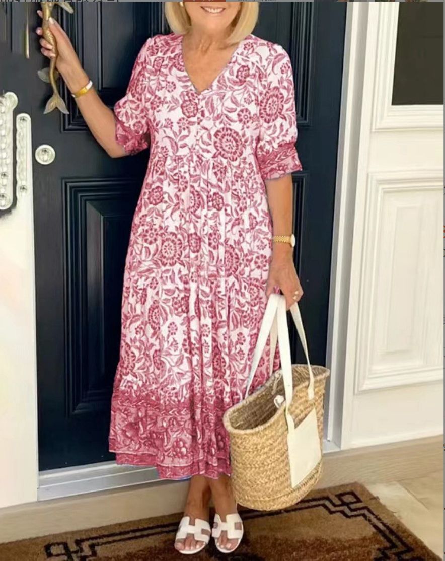 Red floral V-neck dress with short sleeves and gathered tiered skirt