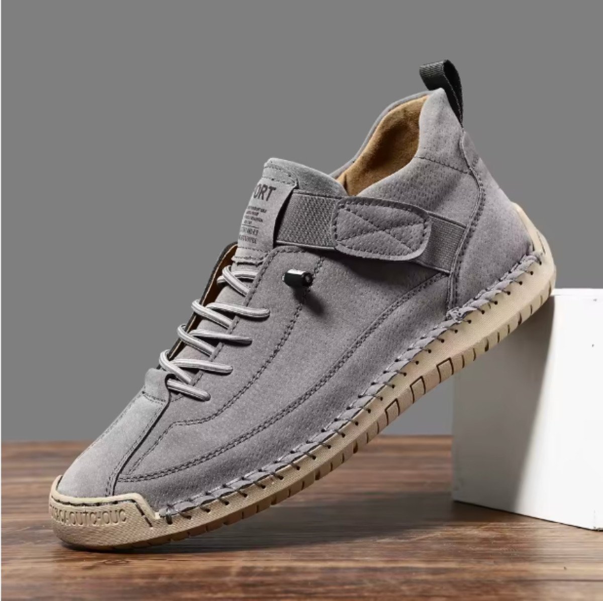 Grey comfort support sneaker with hook-and-loop strap, lace-up front, cushioned sole