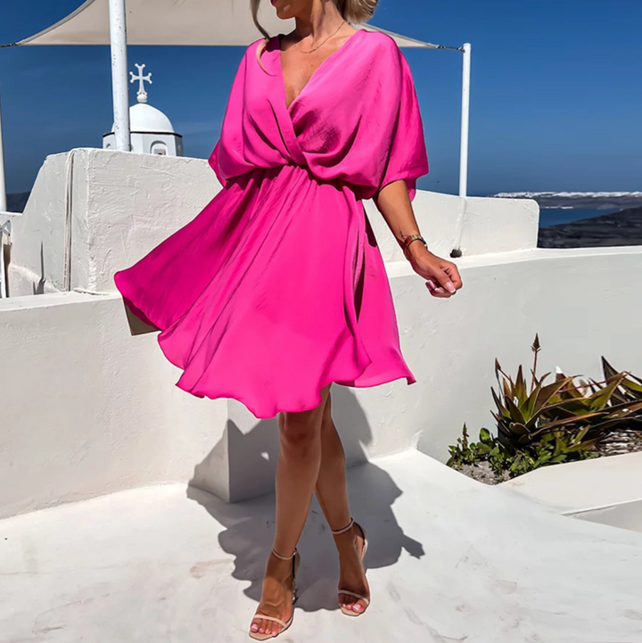 Women's short-sleeve draped dress with gathered waist, bright pink