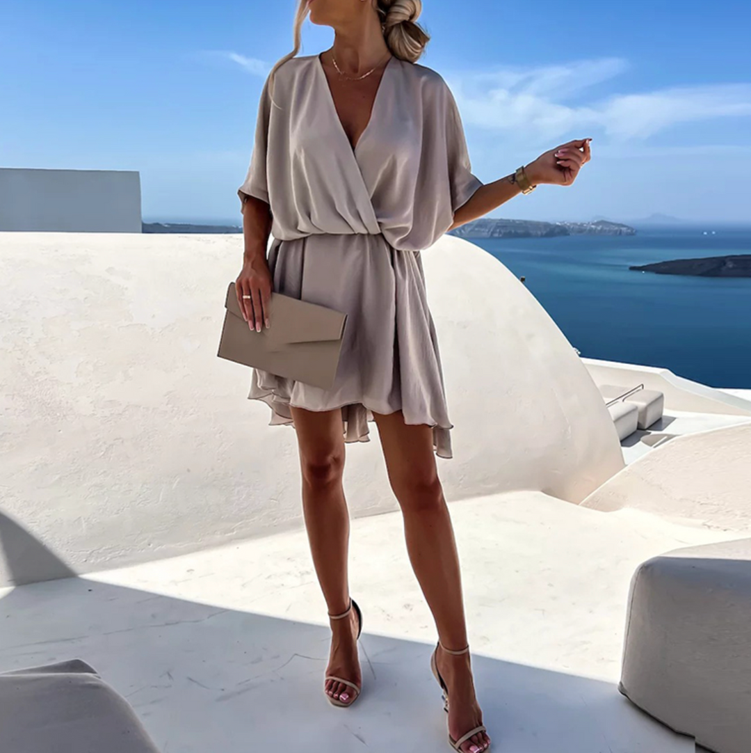 Light gray V-neck mini dress with tie waist and short loose sleeves