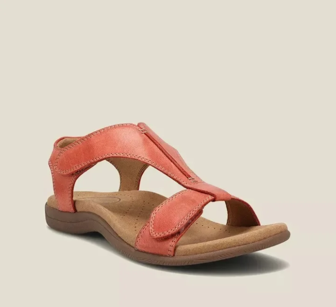 Coral-red orthopedic sandals with adjustable ankle strap and cushioned sole