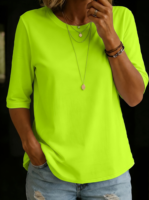 Neon green crewneck comfort tee with 3/4 sleeves and draped fit