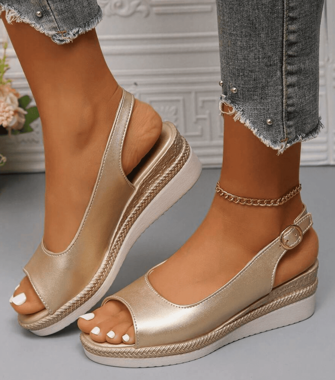 Gold orthopedic sandals with open toe, ankle strap buckle, textured wedge platform.