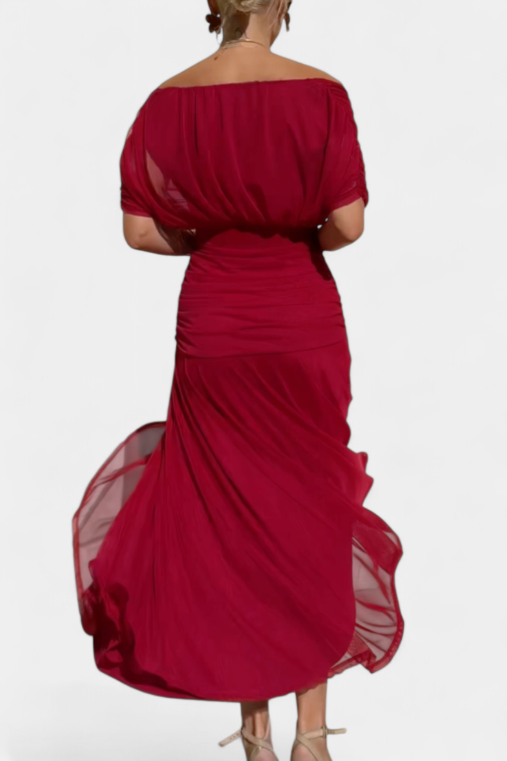 Long red off-shoulder dress with ruched waist and flowing layered skirt