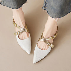 Pair of white genuine leather mules with gold-tone buckle straps and pointed toe