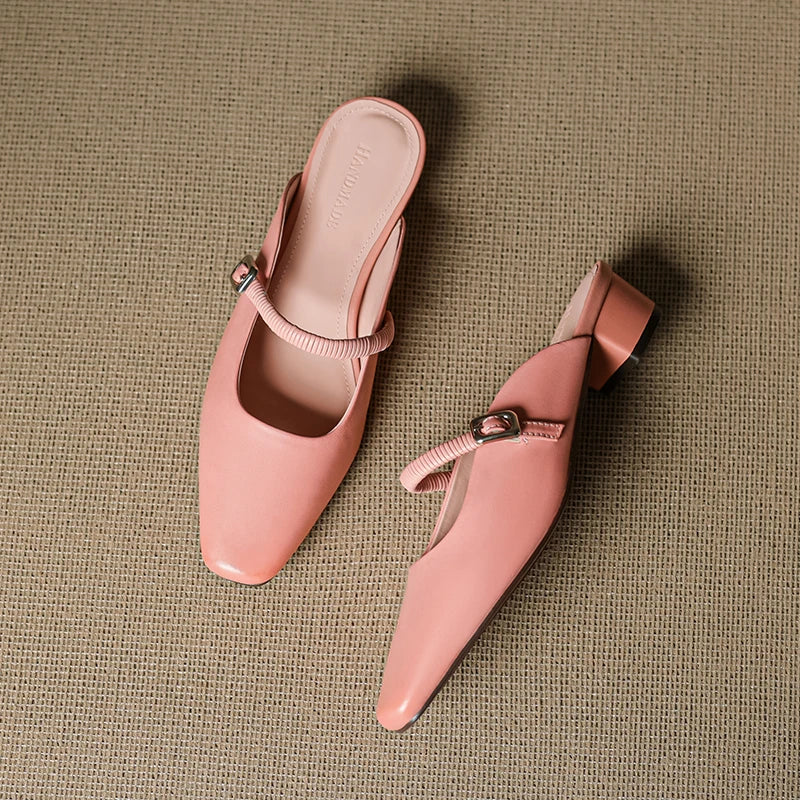 Pink Mary Jane mules, one front view and one side view, square buckle and block heel