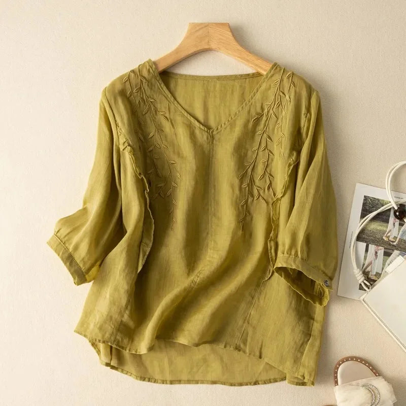 Loose retro cotton-linen top in olive green with leaf embroidery and V neckline
